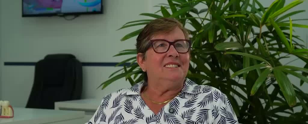 Sorriso transformado de paciente OdontoMax 1