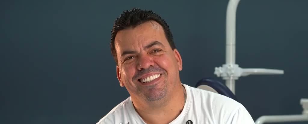 Sorriso transformado de paciente OdontoMax 4
